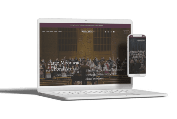 Mockup showing a laptop and smartphone displaying the \ website for Fargo Moorhead Choral Artists.
